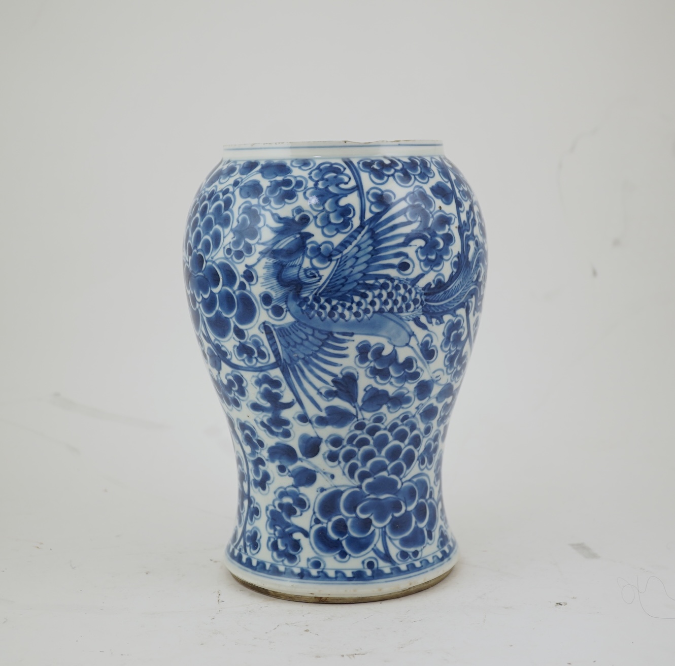 A Chinese blue and white ‘phoenix and peony’ baluster vase, Kangxi period